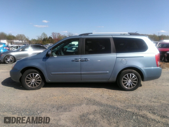 2012 Kia Sedona EX with VIN KNDMH4C70C6420031, listed as a IAAI auction lot 41933639 with 108,130 mi miles. Bid and sale history available at carsss.com. Image 14.