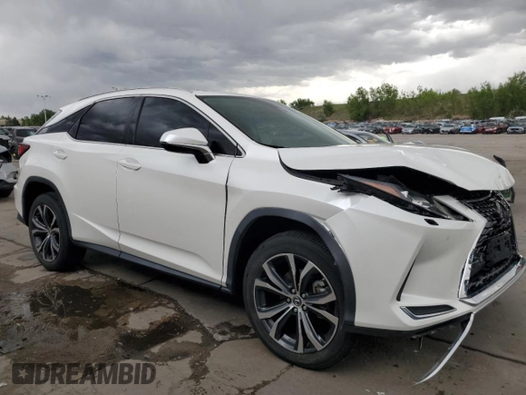2021 Lexus RX 350 with VIN JTJHZMDA7M2051652, listed as a Copart auction lot 57218985 with 17,013 mi miles and Salvage title. Bid and sale history available at DreamBid. Image 4.