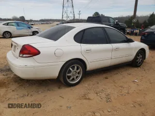 2004 Ford Taurus z VIN 1FAFP52214A194125, wystawiony jako Copart lot #43234295 z przebiegiem 216 877 mil mil oraz Szkody całkowita. Historia ofert i sprzedaży dostępna na DreamBid. Obrazek 3.