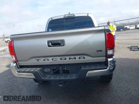 2018 Toyota Tacoma SR5 with VIN 5TFAZ5CN6JX057889, listed as a IAAI auction lot 41449604 with 114,888 mi miles and . Bid and sale history available at DreamBid. Image 16.