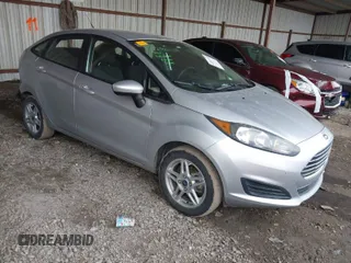 2018 Ford Fiesta SE with VIN 3FADP4BJ2JM133499, listed as a IAAI auction lot 41547240 with 125,186 mi miles. Bid and sale history available at carsss.com. Image 1.