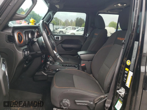 2023 Jeep Gladiator Mojave z VIN 1C6JJTEG1PL500564, wystawiony jako Copart lot #58785165 z przebiegiem 37 829 mil mil oraz Szkoda całkowita • Salvage title. Historia ofert i sprzedaży dostępna na DreamBid. Obrazek 7.
