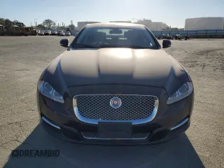 2014 Jaguar XJ with VIN SAJWA1CZ3E8V69877, listed as a Copart auction lot 48159005 with 57,567 mi miles and Clean Title. Bid and sale history available at DreamBid. Image 5.