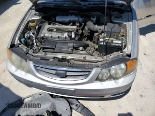 2004 Kia Spectra GS with VIN KNAFB161945141309, listed as a Copart auction lot 52395445 with 99,100 mi miles and Clean Title. Bid and sale history available at DreamBid. Image 11.