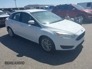 2015 Ford Focus SE z VIN 1FADP3F28FL334359, wystawiony jako IAAI lot #42520827 z przebiegiem 182 755 mil mil oraz . Historia ofert i sprzedaży dostępna na DreamBid. Obrazek 1.
