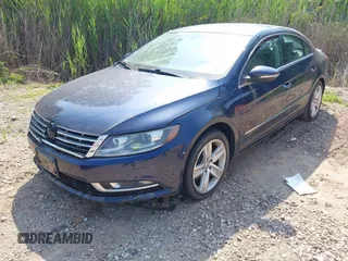 2013 Volkswagen CC Sport Plus z VIN WVWBP7ANXDE553061, wystawiony jako IAAI lot #42468114 z przebiegiem 106 812 mil mil oraz . Historia ofert i sprzedaży dostępna na DreamBid. Obrazek 2.