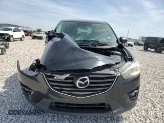 2016 Mazda CX-5 Touring with VIN JM3KE4CY5G0667179, listed as a Copart auction lot 49414625 with 90,155 mi miles and Salvage Title. Bid and sale history available at carsss.com. Image 14.