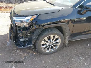 2023 Toyota RAV4 XLE Premium with VIN 2T3C1RFVXPC247647, listed as a IAAI auction lot 41997072 with 27,326 mi miles and . Bid and sale history available at DreamBid. Image 6.