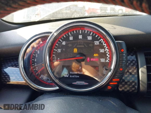 2016 MINI Hardtop John Cooper Works with VIN WMWXM9C58GT996815, listed as a IAAI auction lot 41756661 with 146,450 mi miles and . Bid and sale history available at DreamBid. Image 7.