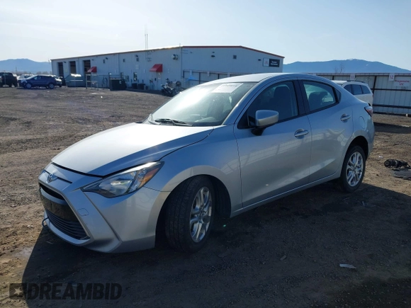 2018 Toyota Yaris with VIN 3MYDLBYV8JY328229, listed as a IAAI auction lot 41949610 with 54,651 mi miles and . Bid and sale history available at DreamBid. Image 2.