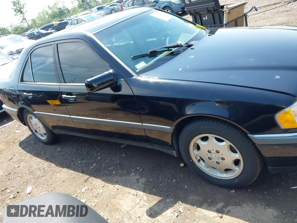 1997 Mercedes-Benz C z VIN WDBHA23E7VF501943, wystawiony jako IAAI lot #42275734 z przebiegiem Nie podano mil oraz . Historia ofert i sprzedaży dostępna na DreamBid. Obrazek 13.