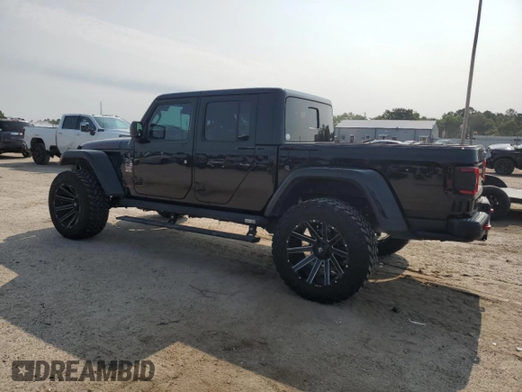2020 Jeep Gladiator Rubicon with VIN 1C6JJTBG2LL166964, listed as a Copart auction lot 58041945 with 62,716 mi miles and Salvage title. Bid and sale history available at DreamBid. Image 2.