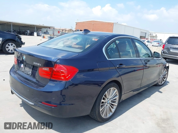 2013 BMW 3 Series 328i with VIN WBA3C1G51DNR49252, listed as a IAAI auction lot 42322739 with 119,421 mi miles and . Bid and sale history available at DreamBid. Image 4.