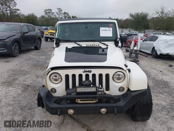 2014 Jeep Wrangler Unlimited Sahara with VIN 1C4BJWEG0EL151473, listed as a IAAI auction lot 41600726 with 119,057 mi miles. Bid and sale history available at carsss.com. Image 12.