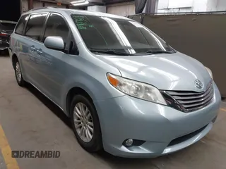 2015 Toyota Sienna XLE with VIN 5TDYK3DC3FS605770, listed as a IAAI auction lot 41776512 with 126,206 mi miles. Bid and sale history available at carsss.com. Image 1.