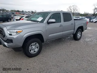 2020 Toyota Tacoma 4WD SR5 with VIN 3TMCZ5AN2LM300117, listed as a IAAI auction lot 41874864 with 59,594 mi miles. Bid and sale history available at carsss.com. Image 2.