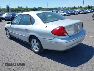 2000 Ford Taurus SES with VIN 1FAFP55U8YG234331, listed as a IAAI auction lot 42797654 with 103,742 mi miles and . Bid and sale history available at DreamBid. Image 3.