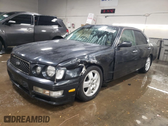 1997 Nissan Maxima with VIN HBY33200347, listed as a Copart auction lot 47182085 with 173,662 mi miles and Salvage title. Bid and sale history available at DreamBid. Image 1.