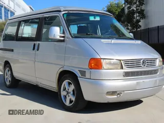 2003 Volkswagen EuroVan MV с VIN WV2NB47003H003033, выставлен на аукционе Copart как лот 59629785 с пробегом 164 173 миль миль и Чистый • Clean title. История ставок и продаж доступна на DreamBid. Изображение 1.
