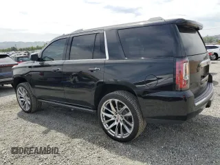2015 GMC Yukon Denali z VIN 1GKS2CKJ9FR609462, wystawiony jako Copart lot #56685575 z przebiegiem 125 679 mil mil oraz Szkoda całkowita • Salvage title. Historia ofert i sprzedaży dostępna na DreamBid. Obrazek 2.