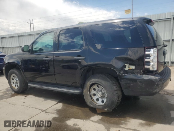 2013 Chevrolet Tahoe Commercial with VIN 1GNSK2E02DR342419, listed as a Copart auction lot 57908885 with 76,486 mi miles and Salvage title. Bid and sale history available at DreamBid. Image 2.