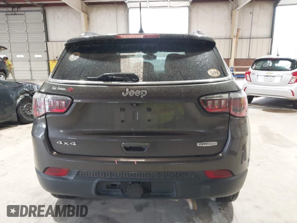 2018 Jeep Compass Latitude with VIN 3C4NJDBB9JT116391, listed as a IAAI auction lot 41953729 with 129,331 mi miles and . Bid and sale history available at DreamBid. Image 16.