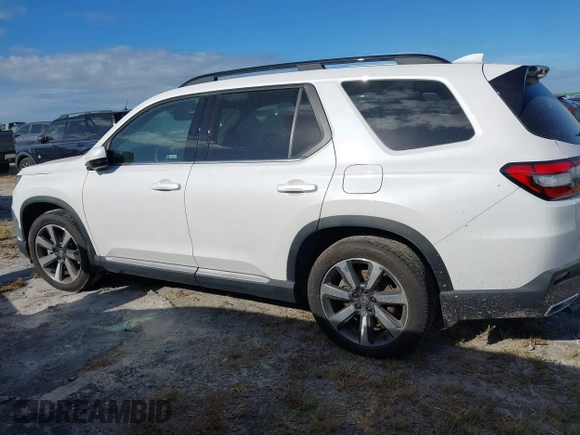 2024 Honda Pilot Elite with VIN 5FNYG1H81RB025163, listed as a IAAI auction lot 40502507 with 9,867 mi miles. Bid and sale history available at carsss.com. Image 14.