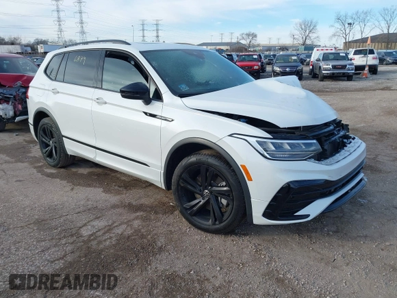 2023 Volkswagen Tiguan SE R-Line Black with VIN 3VV8B7AX9PM086225, listed as a IAAI auction lot 41276879 with Not provided miles and . Bid and sale history available at DreamBid. Image 1.