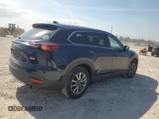 2016 Mazda CX-9 Touring z VIN JM3TCACY8G0117354, wystawiony jako Copart lot #56660935 z przebiegiem 112 365 mil mil oraz Szkoda całkowita • Salvage title. Historia ofert i sprzedaży dostępna na DreamBid. Obrazek 3.
