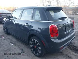 2016 MINI Cooper Hardtop 4 Door S with VIN WMWXU3C56G2B63682, listed as a IAAI auction lot 41244676 with 110,902 mi miles. Bid and sale history available at carsss.com. Image 3.