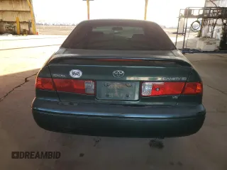 2001 Toyota Camry LE z VIN JT2BF22K510303027, wystawiony jako Copart lot #85090174 z przebiegiem 253 038 mil mil oraz Szkoda całkowita • Salvage title. Historia ofert i sprzedaży dostępna na DreamBid. Obrazek 6.