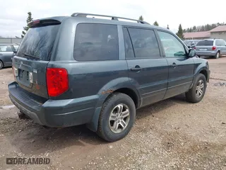 2004 Honda Pilot EX with VIN 2HKYF18494H557884, listed as a IAAI auction lot 42075748 with 205,723 mi miles. Bid and sale history available at carsss.com. Image 4.