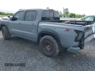 2022 Nissan Frontier SV z VIN 1N6ED1EJ0NN629038, wystawiony jako IAAI lot #41313351 z przebiegiem 98 234 mil mil oraz . Historia ofert i sprzedaży dostępna na DreamBid. Obrazek 3.