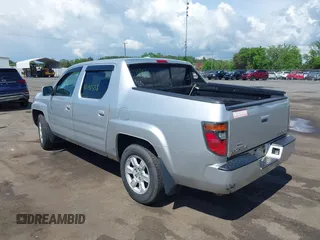2007 Honda Ridgeline RTL z VIN 2HJYK16527H521549, wystawiony jako IAAI lot #42192558 z przebiegiem 227 162 mil mil oraz . Historia ofert i sprzedaży dostępna na DreamBid. Obrazek 3.