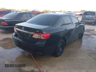 2013 Toyota Corolla L with VIN 2T1BU4EE6DC935978, listed as a IAAI auction lot 42111995 with 200,152 mi miles. Bid and sale history available at carsss.com. Image 4.