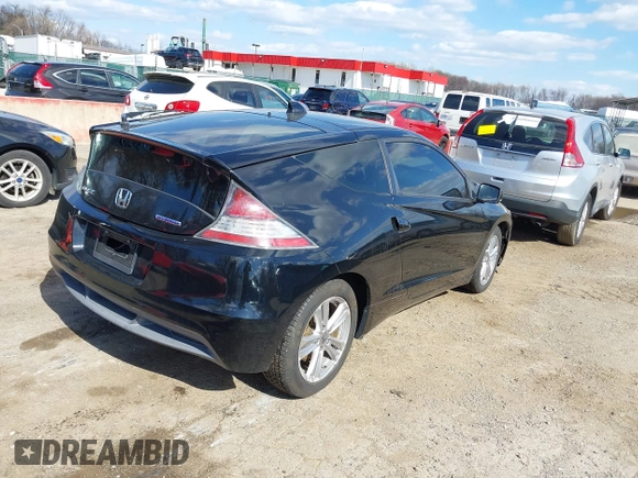2011 Honda CR-Z EX with VIN JHMZF1D68BS004880, listed as a IAAI auction lot 41890806 with 129,204 mi miles and . Bid and sale history available at DreamBid. Image 4.