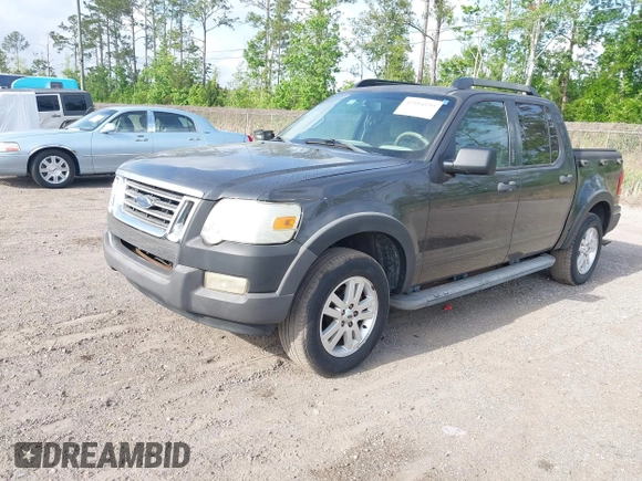 2007 Ford Explorer Sport Trac XLT with VIN 1FMEU31K27UB31618, listed as a IAAI auction lot 42104195 with 110,889 mi miles. Bid and sale history available at carsss.com. Image 2.