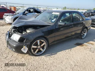 1999 Mercedes-Benz C with VIN WDBHA33E5XF777031, listed as a Copart auction lot 57914774 with Not provided miles and Salvage title. Bid and sale history available at DreamBid. Image 1.
