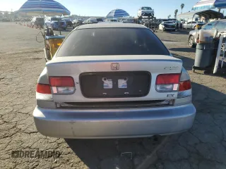 1997 Honda Civic DX with VIN 1HGEJ6125VL011041, listed as a Copart auction lot 83786224 with 208,170 mi miles and Salvage Title. Bid and sale history available at carsss.com. Image 6.