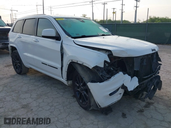 2017 Jeep Grand Cherokee Laredo with VIN 1C4RJEAG1HC720656, listed as a IAAI auction lot 42263500 with 184,239 mi miles and . Bid and sale history available at DreamBid. Image 1.