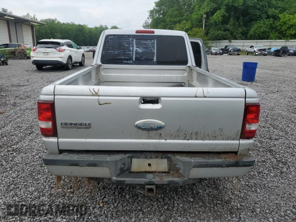 2010 Ford Ranger XLT with VIN 1FTKR4EEXAPA44803, listed as a Copart auction lot 55351865 with 98,774 mi miles and Salvage title. Bid and sale history available at DreamBid. Image 6.