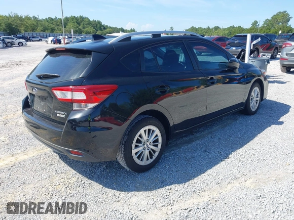 2017 Subaru Impreza Premium with VIN 4S3GTAD63H3722339, listed as a IAAI auction lot 42530573 with 120,114 mi miles and . Bid and sale history available at DreamBid. Image 4.