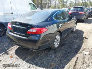 2011 Infiniti M37 with VIN JN1BY1AR4BM376817, listed as a IAAI auction lot 41899491 with 216,754 mi miles. Bid and sale history available at carsss.com. Image 4.