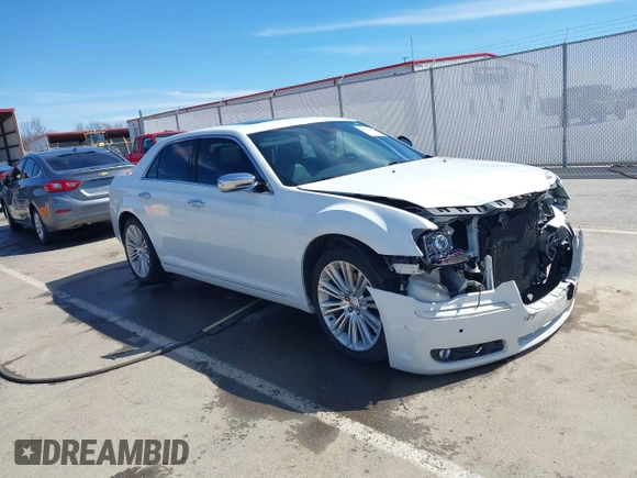 2011 Chrysler 300 with VIN 2C3CA6CTXBH559626, listed as a IAAI auction lot 41876062 with 112,045 mi miles. Bid and sale history available at carsss.com. Image 1.
