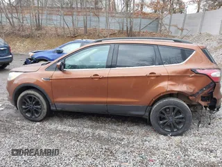 2017 Ford Escape SE with VIN 1FMCU9G96HUC12475, listed as a IAAI auction lot 41741342 with 102,823 mi miles. Bid and sale history available at carsss.com. Image 15.