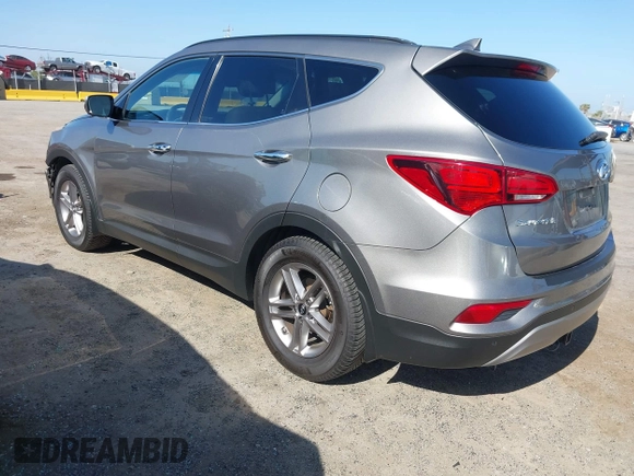 2017 Hyundai Santa Fe 2.4L z VIN 5XYZU3LB4HG446961, wystawiony jako IAAI lot #42214109 z przebiegiem 140 175 mil mil oraz . Historia ofert i sprzedaży dostępna na DreamBid. Obrazek 3.