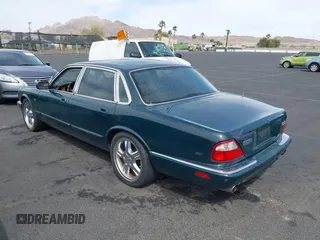 2003 Jaguar XJ with VIN SAJDA15B73MF53499, listed as a IAAI auction lot 41896445 with 95,055 mi miles and . Bid and sale history available at DreamBid. Image 3.