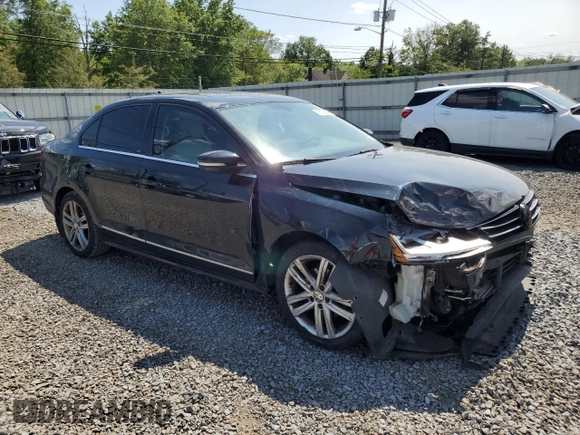 2017 Volkswagen Jetta SEL z VIN 3VWL17AJ6HM404789, wystawiony jako Copart lot #59029645 z przebiegiem 129 788 mil mil oraz Szkoda całkowita • Salvage title. Historia ofert i sprzedaży dostępna na DreamBid. Obrazek 4.
