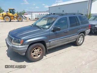 2002 Jeep Grand Cherokee Laredo with VIN 1J4GW48SX2C206755, listed as a IAAI auction lot 42631502 with 155,752 mi miles and . Bid and sale history available at DreamBid. Image 2.