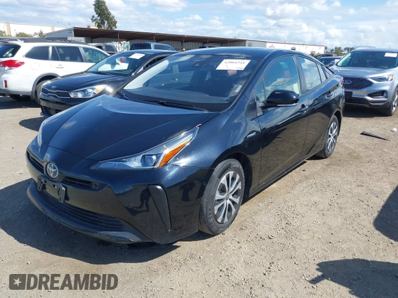 2021 Toyota Prius L Eco with VIN JTDKAMFU6M3135799, listed as a IAAI auction lot 42064241 with 77,120 mi miles and . Bid and sale history available at DreamBid. Image 17.